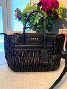 Miu Miu Matelassé black leather w/ shoulder strap
